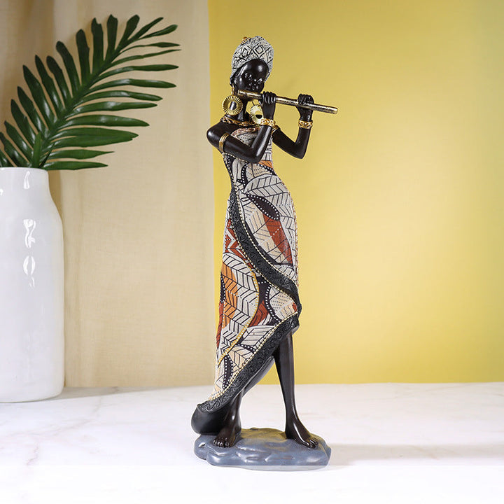 Afrikaanse vrouwelijke muzikantensculptuur