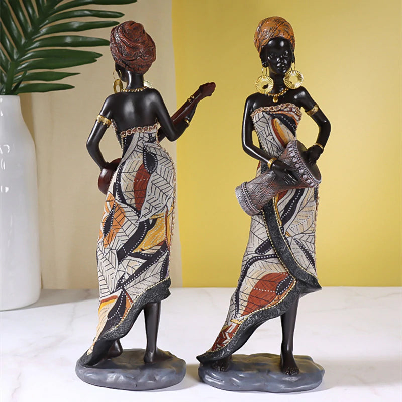 Afrikaanse vrouwelijke muzikantensculptuur