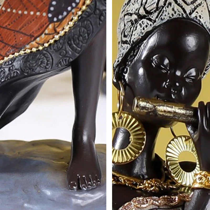 Afrikaanse vrouwelijke muzikantensculptuur