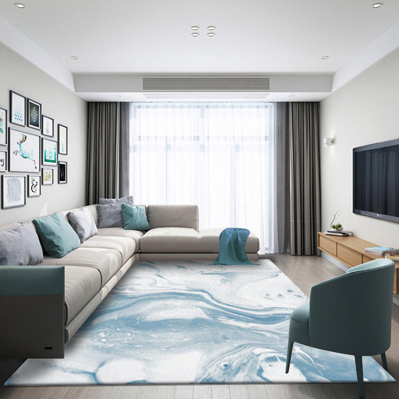Modern tapijt voor de woonkamer in blauw en wit met abstract oceaanprint, tapijt van polyester, machinewasbaar, huisdiervriendelijk tapijt