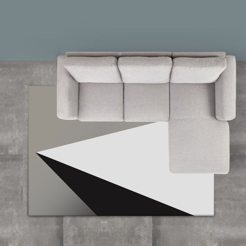 Moderne woonkamer tapijt in grijs en wit, kleurblok driehoek patroon, polyester tapijt, wasbaar tapijt
