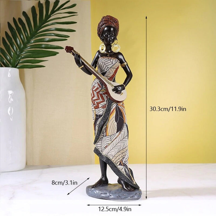 Afrikaanse vrouwelijke muzikantensculptuur