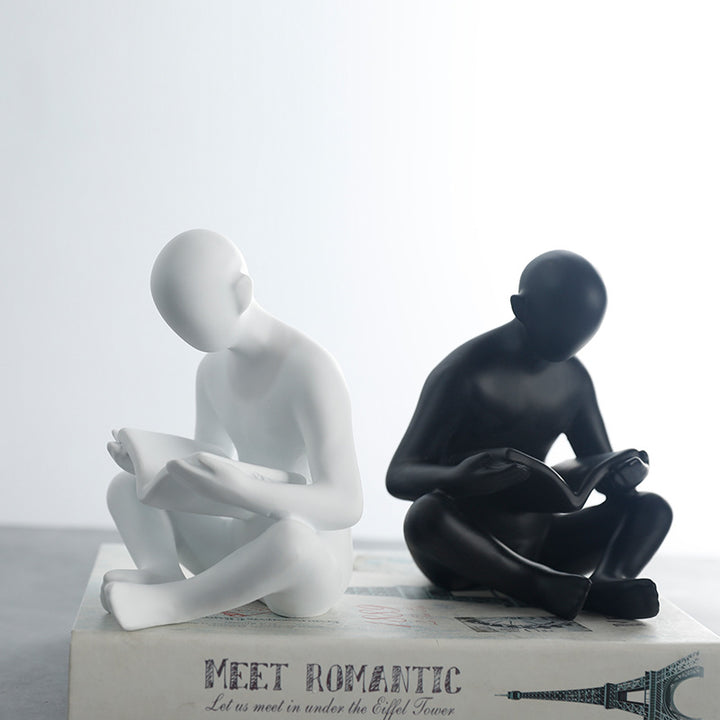 Lezende FIGURINE