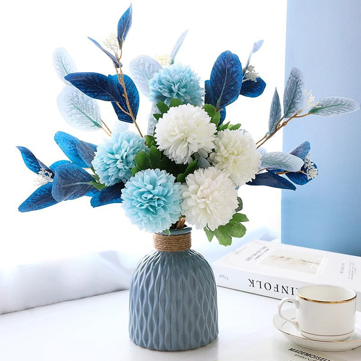 Decoratieve Bloemrijke Schikking met Stijlvolle Vaasje