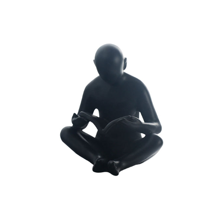 Lezende FIGURINE