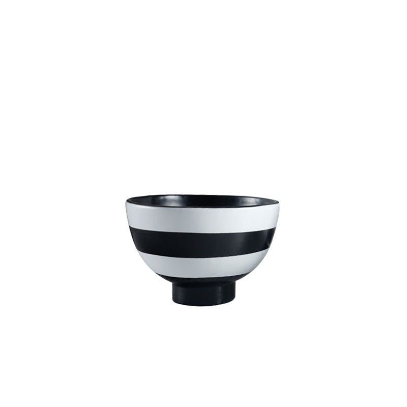 Decoratieve serveerschaal met modern streepdesign