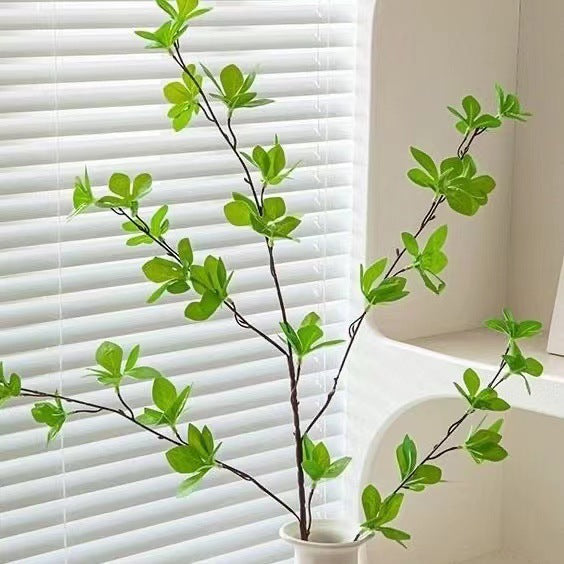 Elegante Glazen Vaas met Levensachtige Groene Arrangement