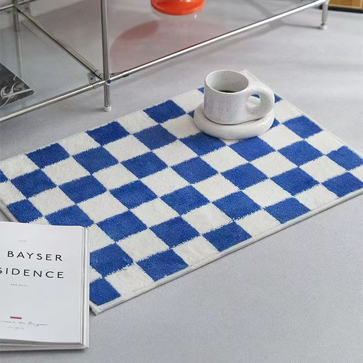 Gekleed met een schaakbordpatroon badmat