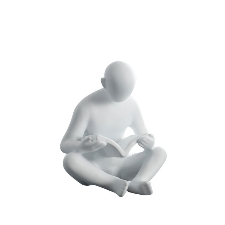 Lezende FIGURINE
