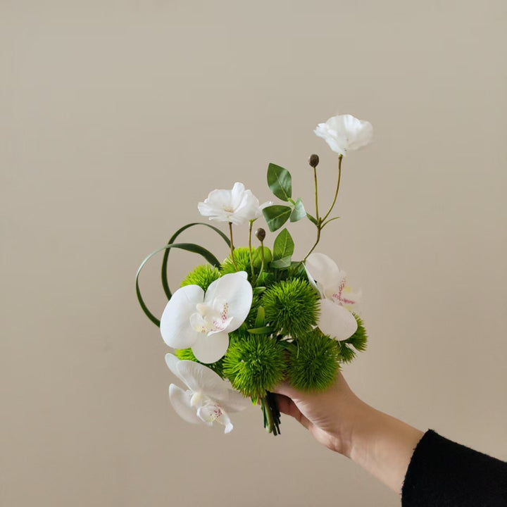 Levensechte Orchidee en Groenblijvende Bloemstuk
