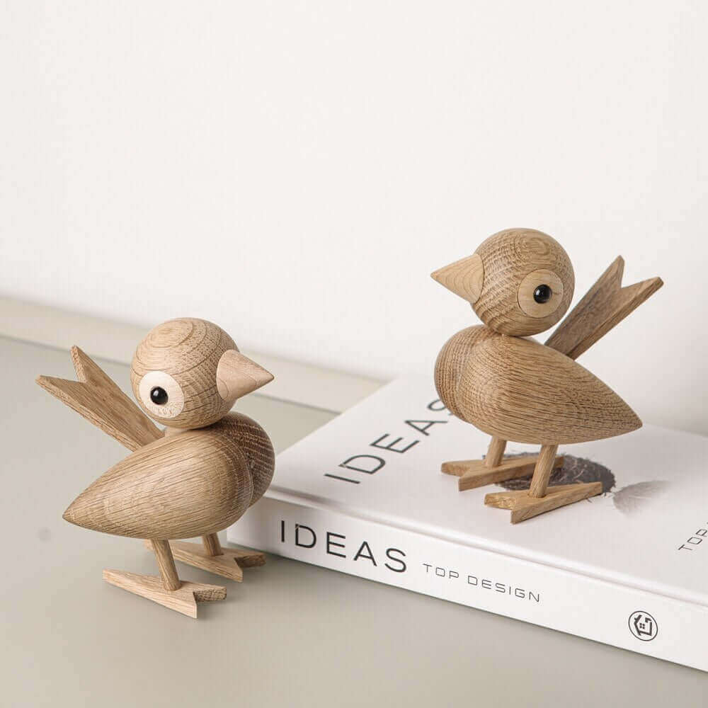Een kleine vogel vertelde het me, Noordse houten ornament
