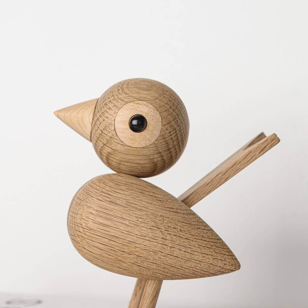Een kleine vogel vertelde het me, Noordse houten ornament