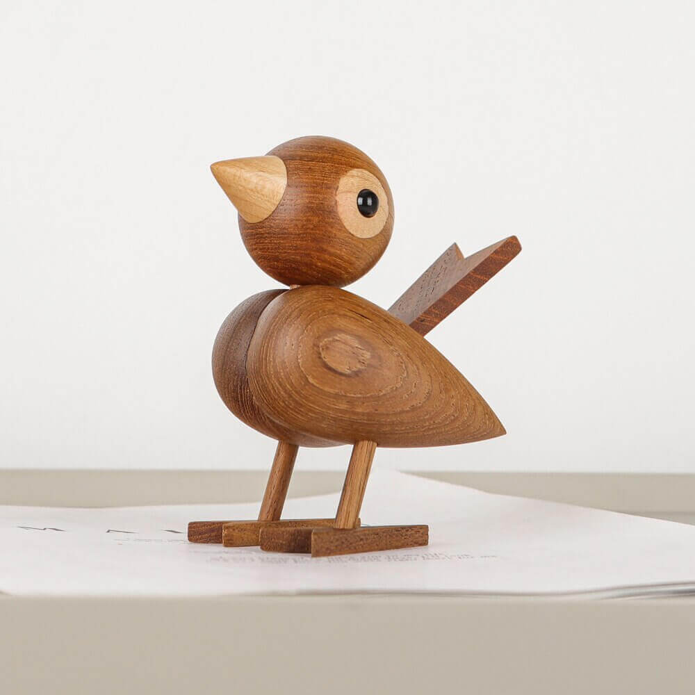 Een kleine vogel vertelde het me, Noordse houten ornament