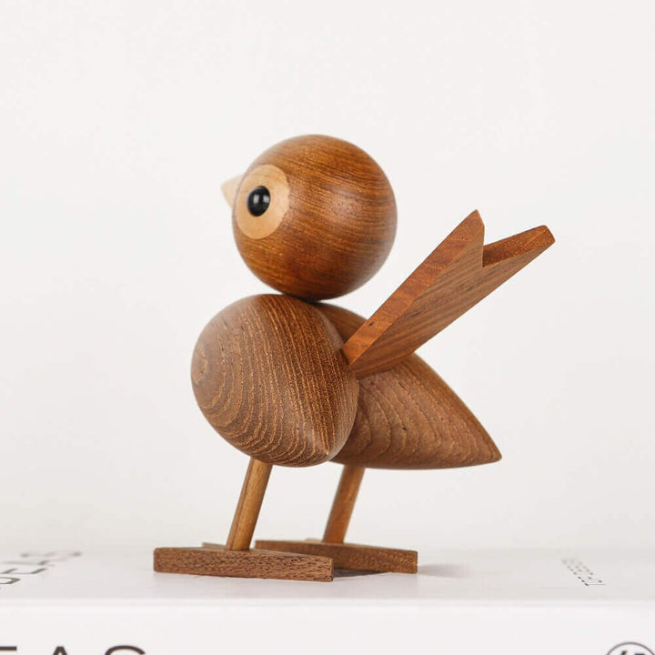 Een kleine vogel vertelde het me, Noordse houten ornament